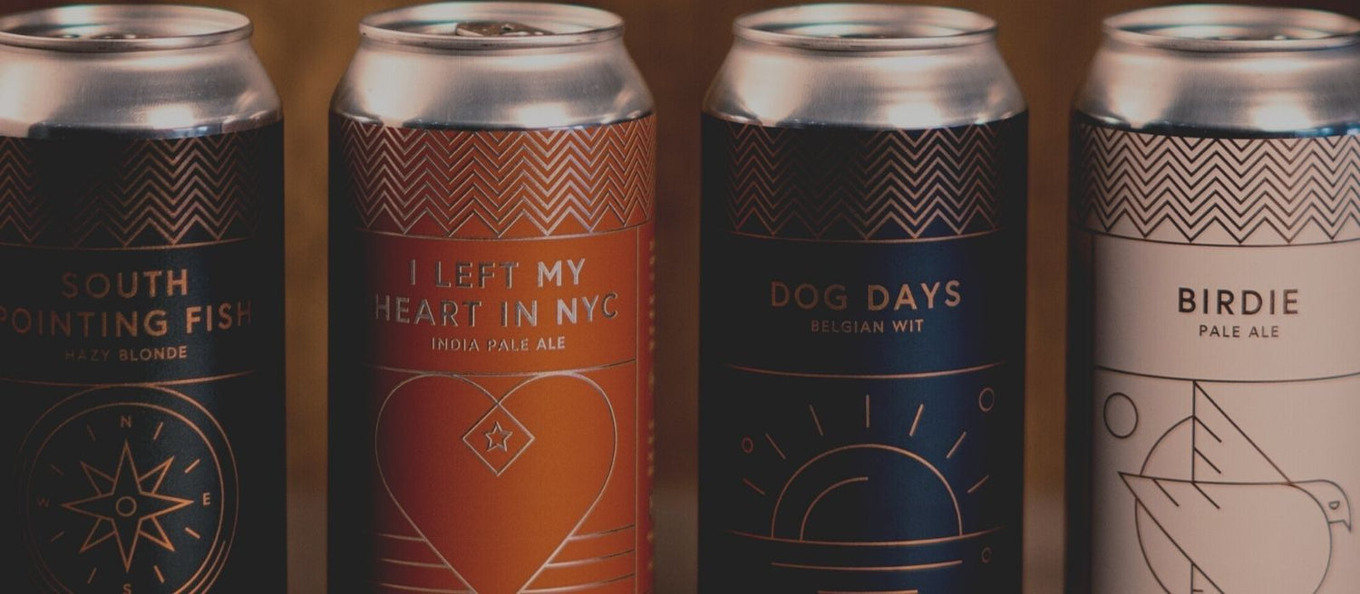 Our Story page | close up of 4 beer cans | Copper Beech Brew Co